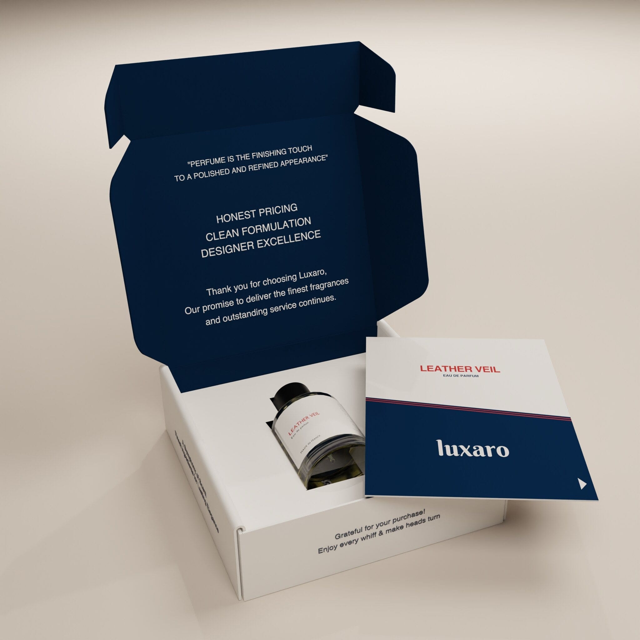 Luxaro Leather Veil perfume inside the box with an information card, inspired by the sophisticated and leathery scent of Tom Ford's Ombre Leather