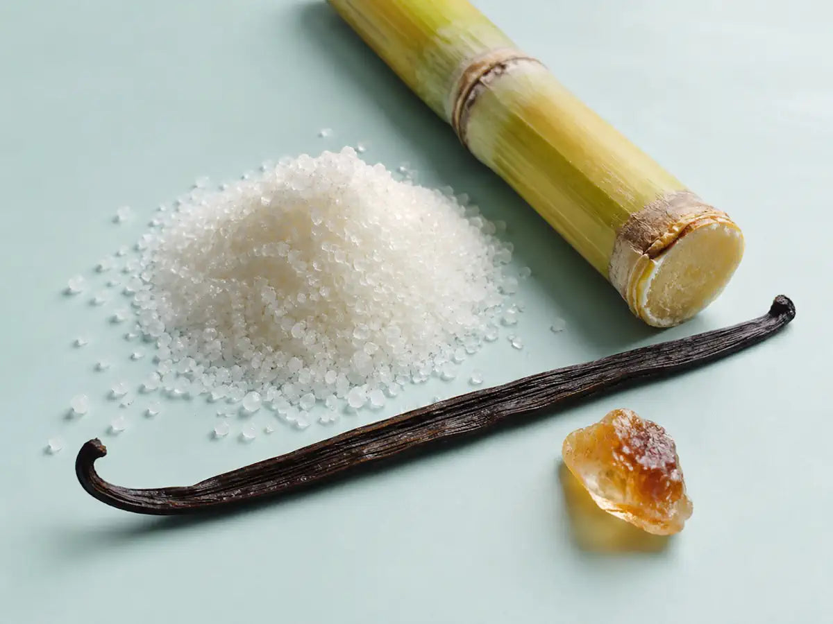 Sugar crystals, sugarcane, vanilla and caramelised sugar representing a sweet perfume accord