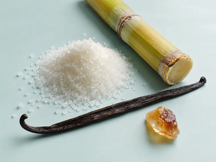 Sugar crystals, sugarcane, vanilla and caramelised sugar representing a sweet perfume accord