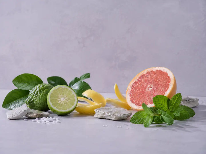 Bergamot, grapefruit, mint, green leaves, sea salt and mineral stones representing the Fresh & Bright fragrance family