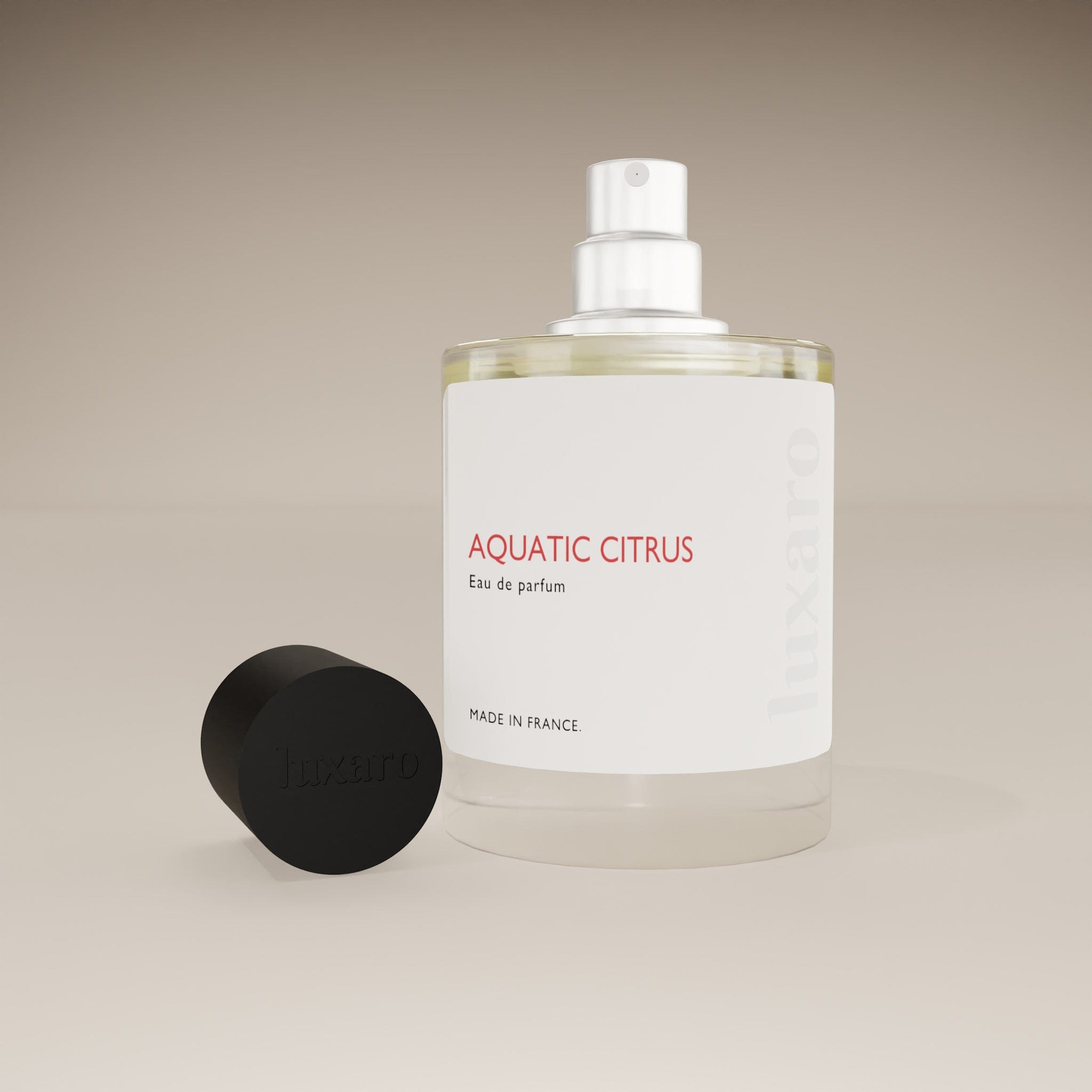Luxaro Aquatic Citrus perfume bottle with cap removed, revealing the fresh, citrusy fragrance inside, inspired by Armani's Acqua Di Gio