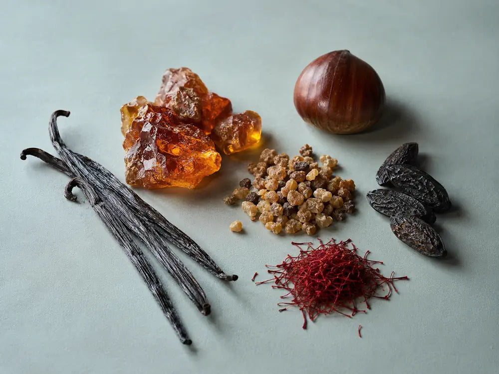 Amber resin, vanilla, myrrh, tonka, saffron and chestnut representing a warm accord in perfume